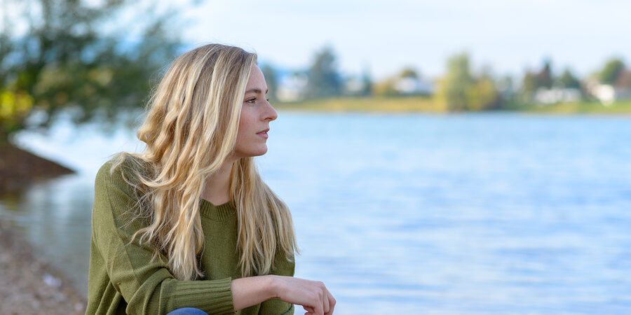 Bigstock Young Thoughtful Woman Sitting 206788408
