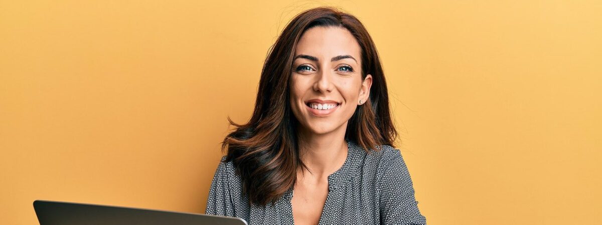 Resized Bigstock Young Brunette Woman Working U 414954221 E1624658461613