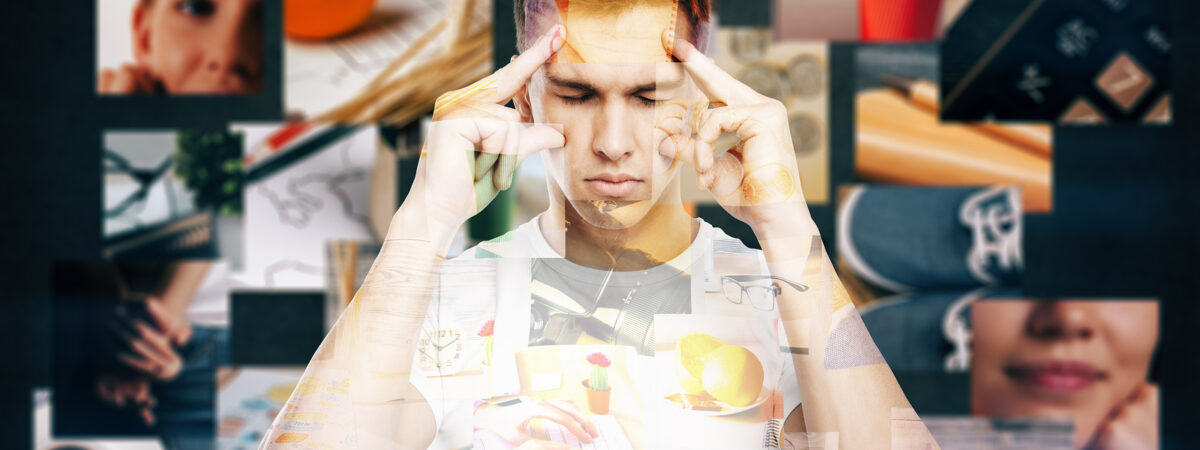 Young man thinking about life with thought images aroud him on dark background
