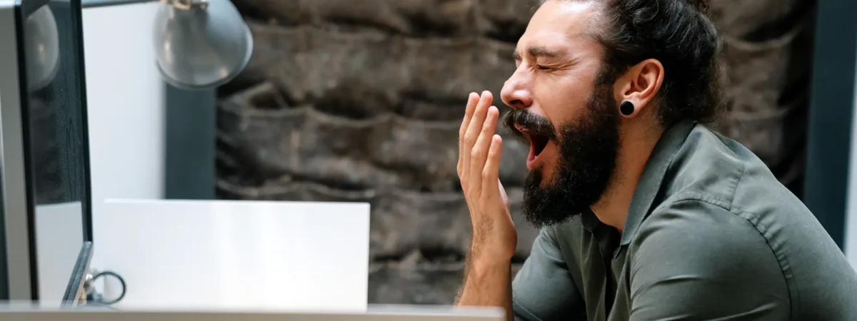 Man Yawning Office