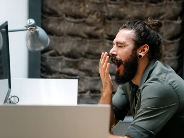 Man Yawning Office