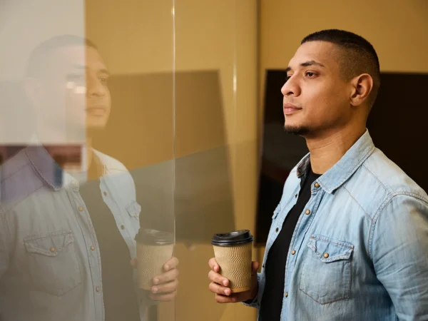 Man Staring Window