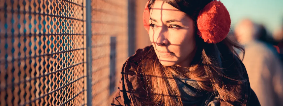 Woman Wearing Ear Muffs