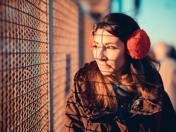 Woman Wearing Ear Muffs